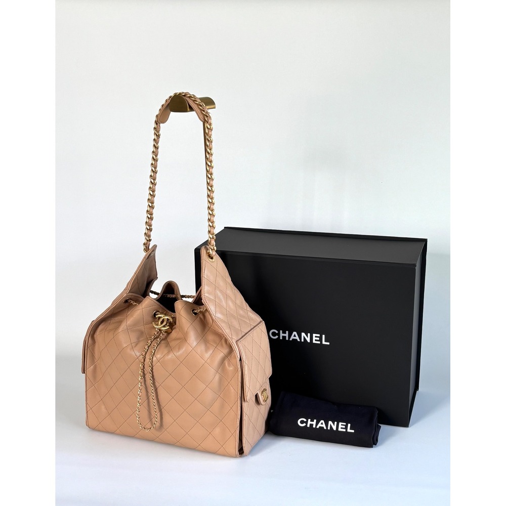 Chanel 25 Quilted Caviar Leather Beige Gold Hardware Drawstring CC, medium siz